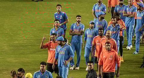 India's head coach Rahul Dravid, skipper Rohit Sharma and other players after the ICC Men's Cricket World Cup 2023 finals. (Photo | PTI)
