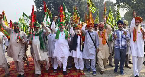 Members of various farmer organisations raise slogans during a protest against the Punjab government against action over stubble burning issue in Patiala on Monday, November 20, 2023. (Photo | PTI)