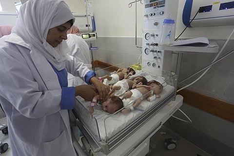 Medical staff care for prematurely born Palestinian babies that were brought from Shifa Hospital in Gaza City to the hospital in Rafah, Gaza Strip, Sunday, Nov. 19, 2023. (AP)