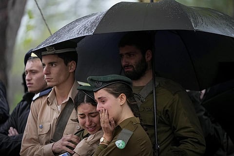 Mourners attend the funeral of Israeli soldier Staff Sergeant Shachar Fridman, Sunday, Nov 19, 2023. (Photo | AP)