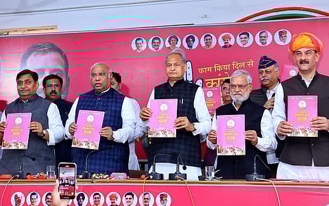 Congress President Mallikarjun Kharge, with Rajasthan CM Ashok Gehlot and other party leaders, releases the party's manifesto for the State Assembly elections, in Jaipur, Nov. 21, 2023. (PTI Photo)