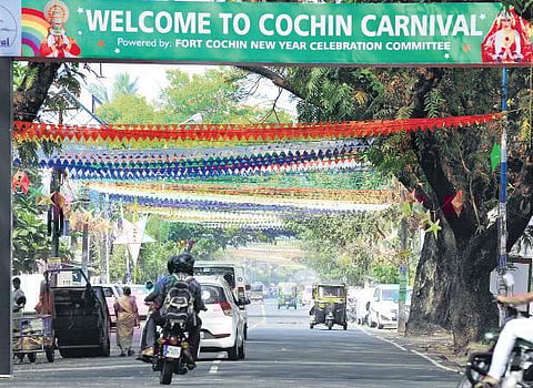 Representational image: The banner put up by the Cochin Carnival Committee. (Below)  The rides at Veli Ground as part of the festivities