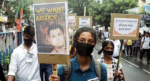 FILE: People from the Bagula village of deceased Swapnadeep Kundu, first-year student of Jadavpur University, take part in a rally to protest his unnatural death.(Photo | ANI)