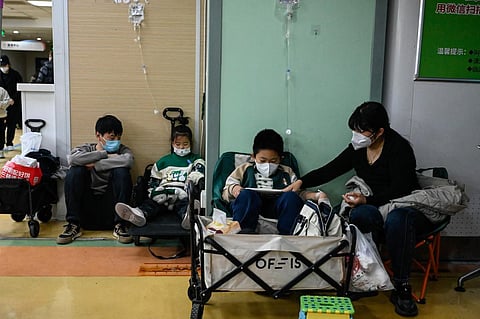 Children receive a drip at a children hospital in Beijing on November 23, 2023. (Photo | AFP)