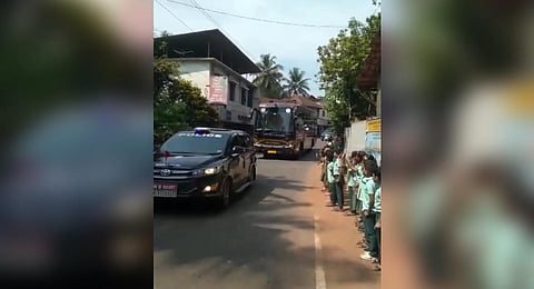 Screengrab of the incident that took place on Wednesday in which students of Chambad LP School, Thalassery, were seen shouting slogans and saluting the CM.