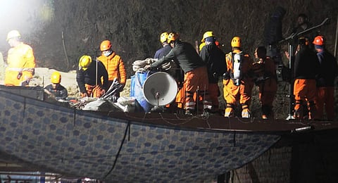 NDRF personnel prepare to enter the Silkyara Tunnel during the rescue operation of 41 workers trapped inside the tunnel for 10 days, in Uttarkashi district. (Photo | PTI)