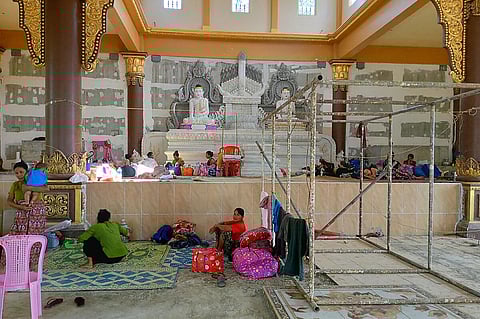 People rest in a monastery that has turn into a temporary shelter for internally displaced people. (Photo | AFP)