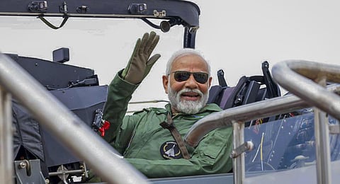 Prime Minister Narendra Modi takes a sortie on the Tejas, in Bengaluru, Saturday, Nov. 25, 2023. (PTI Photo)