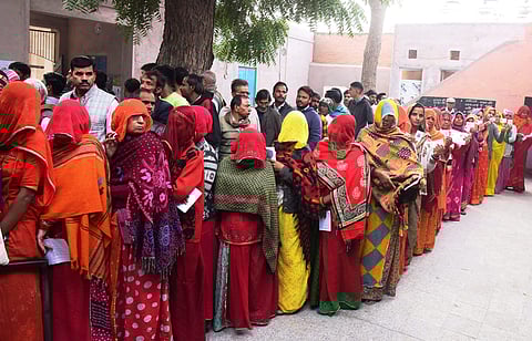Bikaner: People stand in queues to cast their votes for the Rajasthan Assembly elections, in Bikaner, Saturday, Nov. 25, 2023. (Photo | PTI)