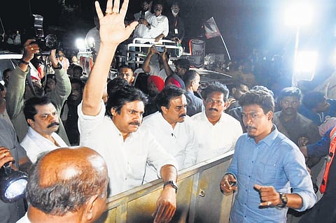 Jana Sena Party chief Pawan Kalyan interacts with fishermen at the fishing harbour in Visakhapatnam on Friday. (Photo I Express)