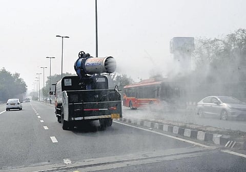 Civic authorities use anti-smog gun to control pollution on Friday, Nov 24, 2023. (Photo | Shekhar Yadav)