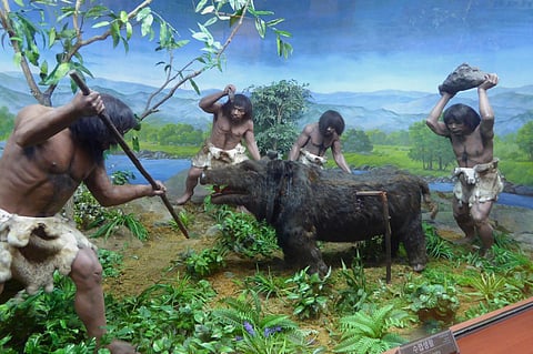 A lifesize scene of Palaeolithic hunters in the Lotte World Folk Museum, Seoul. (Wikimedia Commons)