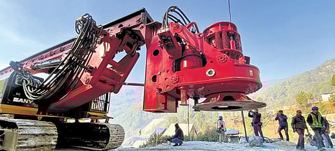 A vertical drilling machine near the under-construction Silkyara tunnel in Uttarkashi district on Saturday | PTI