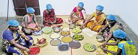 Members of Universal Eco Foundation engaged in the production of food items at their Live Long unit in Villupuram | Sriram R