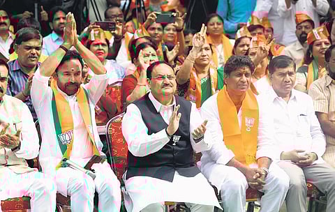 BJP national president JP Nadda with party’s Telangana chief G Kishan Reddy and other leaders listens to ‘Mann Ki Baat’ in Hyderabad on Sunday, Nov 26, 2023. (Photo | PTI)