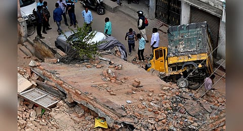 BBMP nursery school collapsed and damaged vehicles parked on Cooks Road at Shivajinagar in Bengaluru on Monday. (Photo | Shashidhar Byrappa)