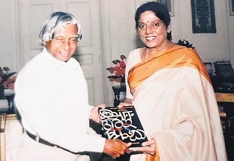 Handing over a copy of the first volume of the book to APJ Abdul Kalam.