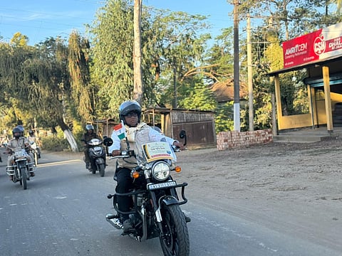 Parimal Suklabaidya out riding a Royal Enfield to create awareness among people on road safety as the incidence of accidents assumes an alarming proportion in Assam.