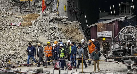 Pramod Kumar Mishra arrives to review the rescue operation being conducted to extract the 41 workers trapped inside the collapsed Silkyara Tunnel, in Uttarkashi district. (Photo | PTI)