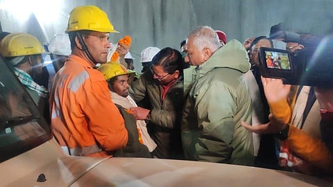 Uttarakhand tunnel rescue: CM Pushkar Singh Dhami meets the workers who have been rescued from inside the Silkyara tunnel. (Photo | ANI)