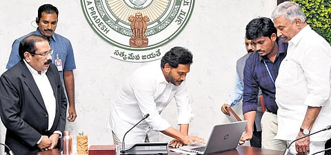 CM Jagan virtually laid the foundation stone for two solar power plants, valued at `3,400 crore, in Annamayya and Sri Sathya Sai districts from his Camp Office in Tadepalli on Tuesday | Express