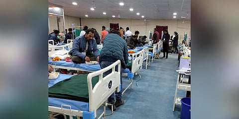 Rescued workers admitted at a community health centre at Chinyalisaur after their successful evacuation from the under-construction Silkyara Bend-Barkot Tunnel, in Uttarkashi district (Photo  | PTI)