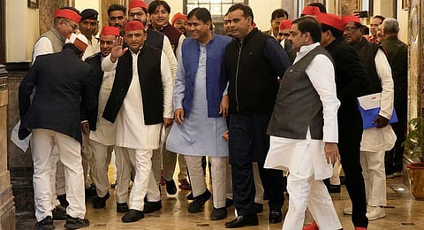 Samajwadi Party President Akhilesh Yadav with the party MLAs arrives to attend the Winter session of the Uttar Pradesh Assembly, in Lucknow, Wednesday, Nov. 29, 2023. (PTI)