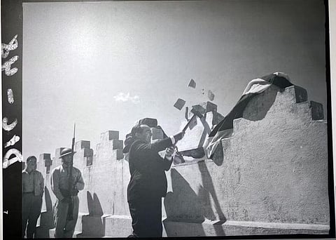 The Costa Rican President on December 1, 1948 symbolically smashed the walls of Bellavista Barracks which houses the army (Source: National Museum Costa Rica)