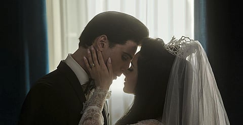 This image released by A24 shows Jacob Elordi as Elvis, left, and Cailee Spaeny as Priscilla, in a scene from 'Priscilla.'