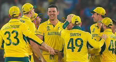 Team Australia celebrate its win against England in the ICC Men's World cup at the Narendra Modi Stadium in Ahmedabad. (Photo | PTI)