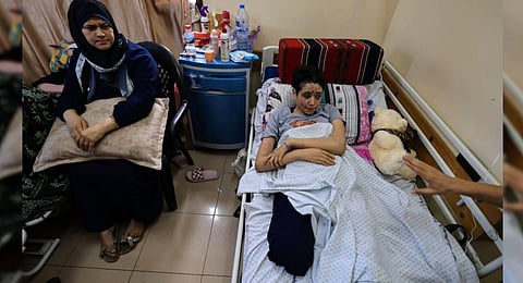 Fourteen year-old amputee Lama al-Agha receives treatment at the Nasser hospital in Khan Yunis in the southern Gaza Strip. (Photo | AFP)