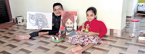 Ganesh and Suma with their art works