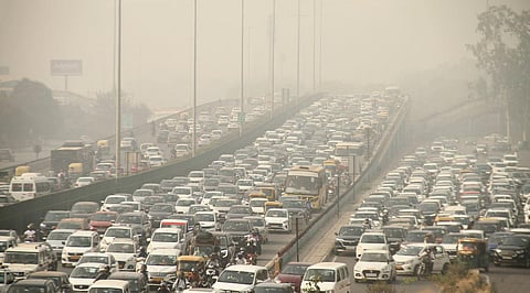 Vehicles stuck in a traffic jam on Delhi-Gurugram Expressway amid low visibility due to smog during a winter morning, in Gurugram, Monday, Nov. 6, 2023. (Photo | PTI)