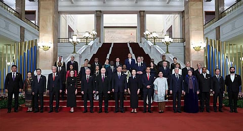 Participants of the Belt and Road Forum pose for a photo in Beijing, China, on Tuesday, Oct. 17, 2023. (PTI)