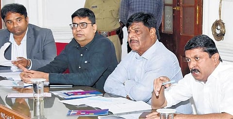 Urban Development Minister Byrathi Suresh chairs a progress review meeting in Mysuru on Monday | s udayshankar