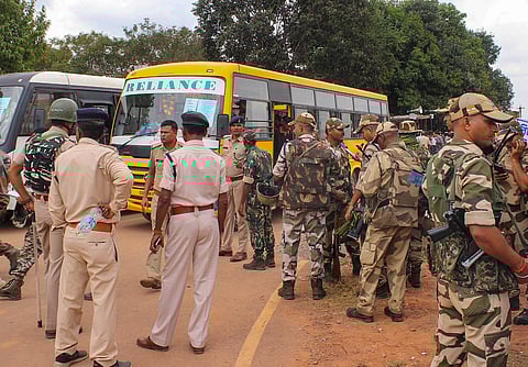 Security personnel prepare to leave for poll duty ahead of Chhattisgarh Assembly elections, at Jagdalpur in Bastar district, on Nov. 6, 2023. (PTI)