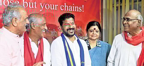 TPCC chief A Revanth Reddy shares a light moment with CPI leaders at Makdoom Bhavan on Monday  | Vinay Madapu