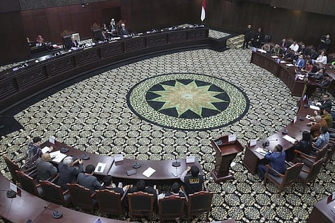 Chairman of the Constitutional Court's Ethic Council Jimly Asshiddiqie delivers his verdict on the probe of ethic violations allegedly conducted by Chief Justice Anwar Usman, in Jakarta. (Photo | AP)