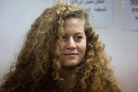 FILE - In this Feb. 13, 2018 file photo, Palestinian activist Ahed Tamimi stands inside the Ofer military prison near Jerusalem. (Photo | AP)