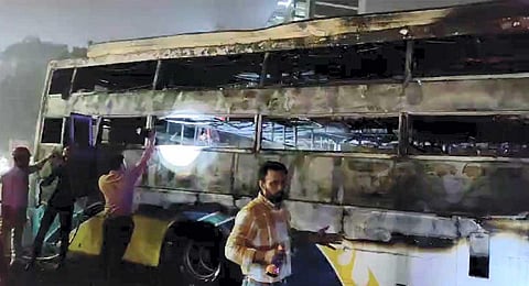 The charred bus after it suddenly caught fire en route to Delhi from Jaipur as it reached Gurugram, Wednesday, Nov. 8, 2023. (PTI)