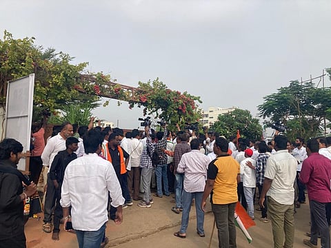 Media personnel, activists and supporters throng at Srinivas Reddy's house on hearing the news about IT raids. ( Express)