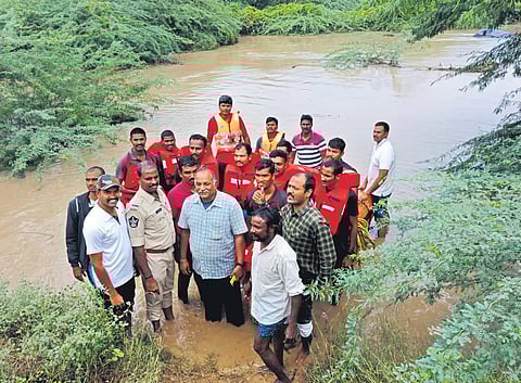 SWAT team of the Prakasam district police rescued a 53-year-old man who was washed away in the Hanumapuram stream near Kothakota. (Photo | Express)