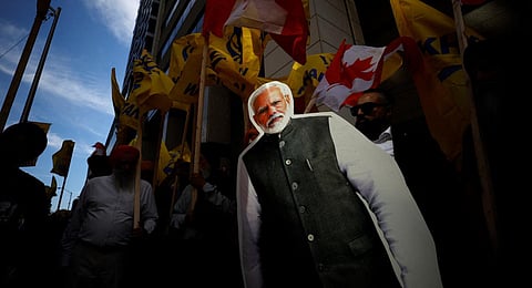 FILE - Protestors hold a cutout of PM Narendra Modi during a Sikh rally outside Indian consulate in Toronto over India's alleged role in separatist Hardeep Nijjar's killing, Sept 25, 2023. (AFP Photo)