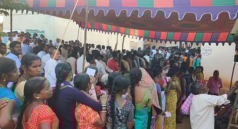 Long Queue with women and young people standing at a poling booth in Tuniki bollaram R&R colony of Gajwell consistency on Thursday evening at 5.45 pm.(Photo | Express)