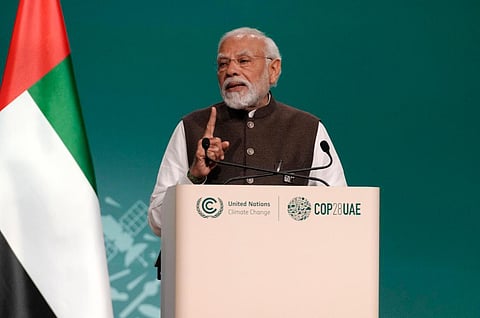 Prime Minister Narendra Modi speaks during a plenary session at the COP28 UN Climate Summit, Friday, Dec. 1, 2023, in Dubai, United Arab Emirates. (AP Photo)