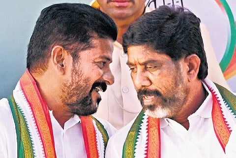 Chief Minister A Revanth Reddy and his deputy Mallu Bhatti Vikramarka share a lighter moment during a programme at Gandhi Bhavan on Saturday |  Vinay Madapu
