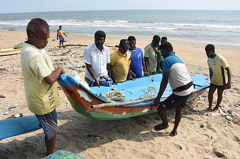 Fishermen who worked to rescue people during the floods, at Besant Nagar in Chennai | (Photo | Ashwin Prasath, EPS)