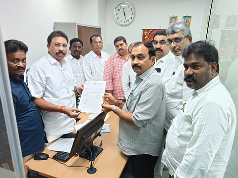 MLA Alla Ramakrishna Reddy tendering his resignation to the Speaker (Officer on Special Duty) Satyanarayana Reddy