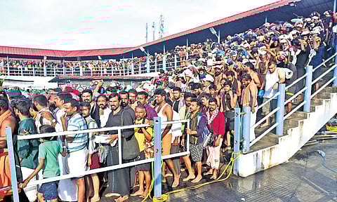 The queue of pilgrims near the sreekovil of the Lord Ayyappa Temple on Monday | Shaji Vettipuram