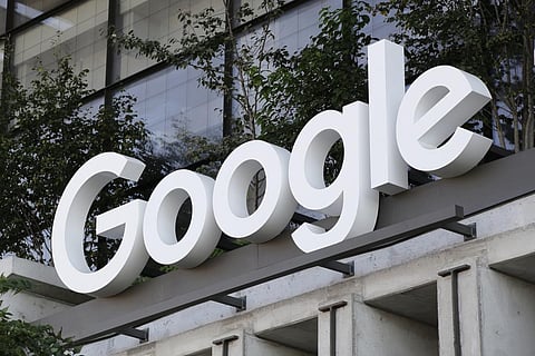 The Google sign is shown over an entrance to the company's new building in New York (Photo | AP)